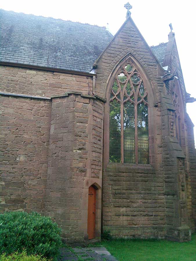 Repairs to arch window on church